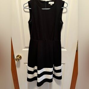 Black with white stripped bottom sleeveless dress